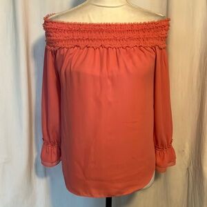 White House black market size small peach colored cold shoulder top
